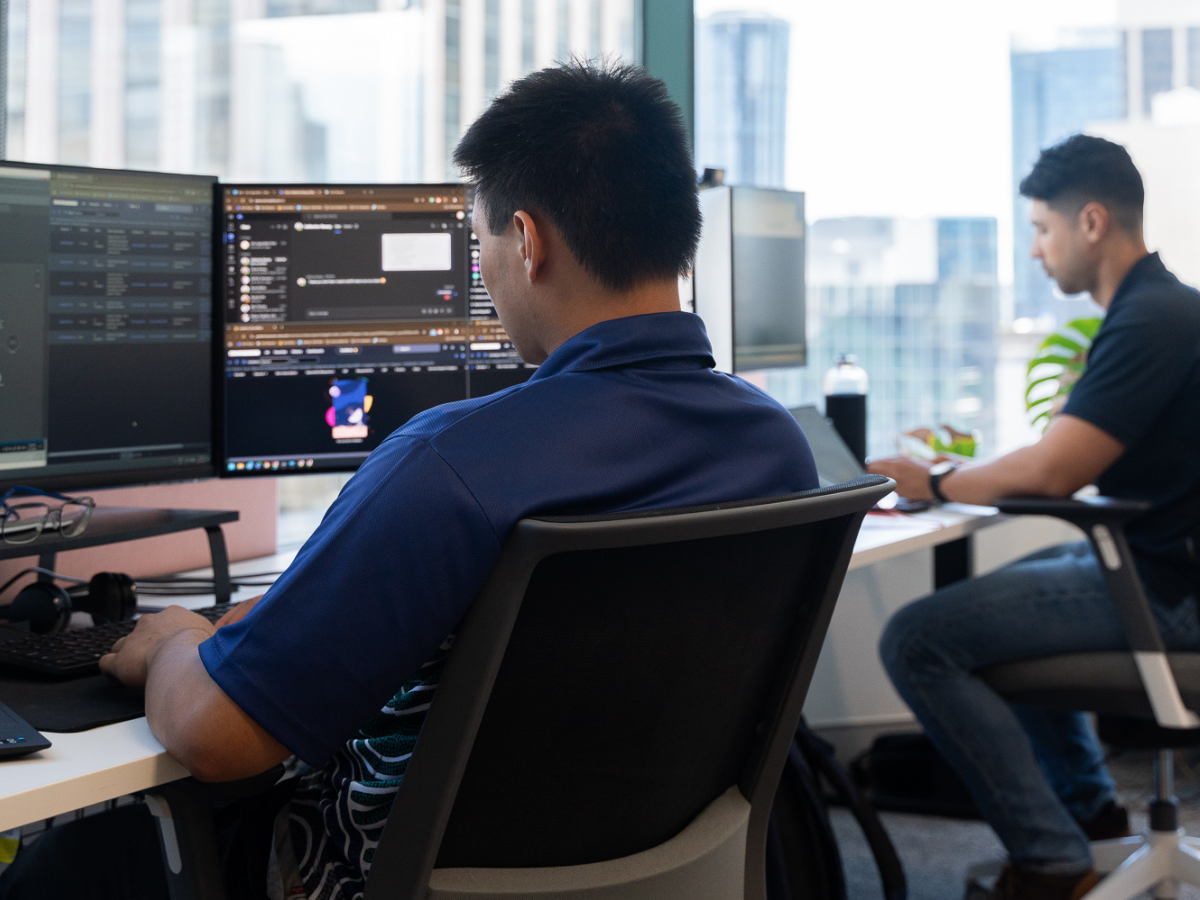 Image of two people providing managed IT services
