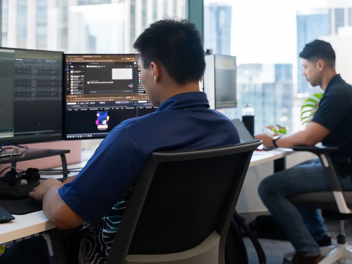 Image of two people providing managed IT services