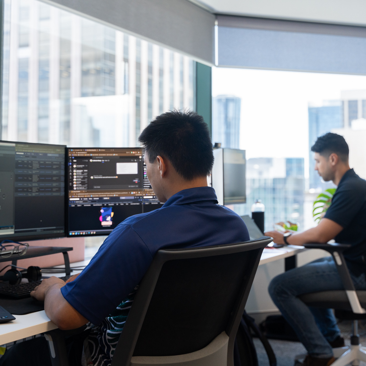 Image of two people providing managed IT services